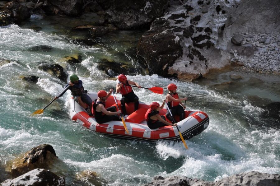 Bovec: Soca River Adventure Rafting With Photos Included - On the river: calm water, swimming breaks, then paddling power