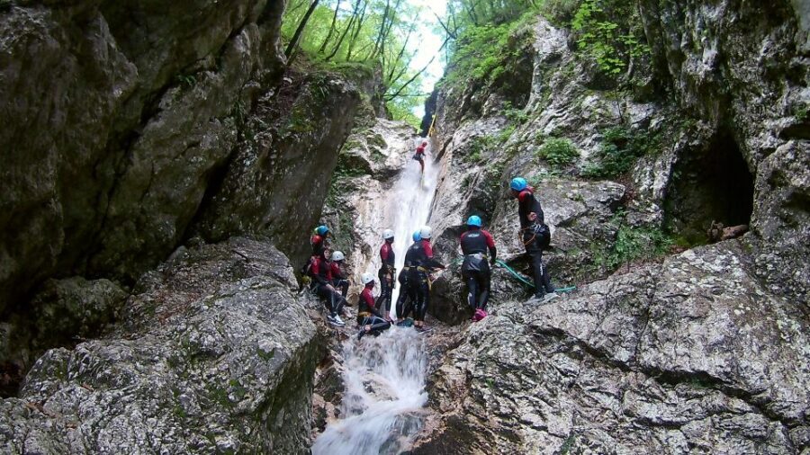 From Bovec: Half-Day Canyoning Tour in Soča Valley - Emerald Creek for about two hours: swims, short jumps, and slides