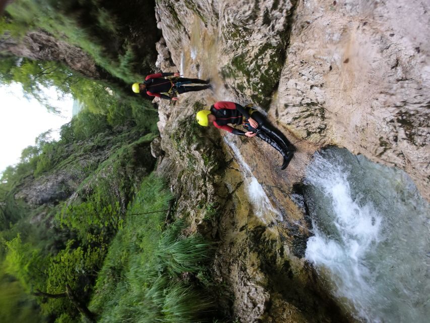 From Bovec: Half-Day Canyoning Tour in Soča Valley - The end-of-route thrills: 8-meter cave slide and 12-meter jump