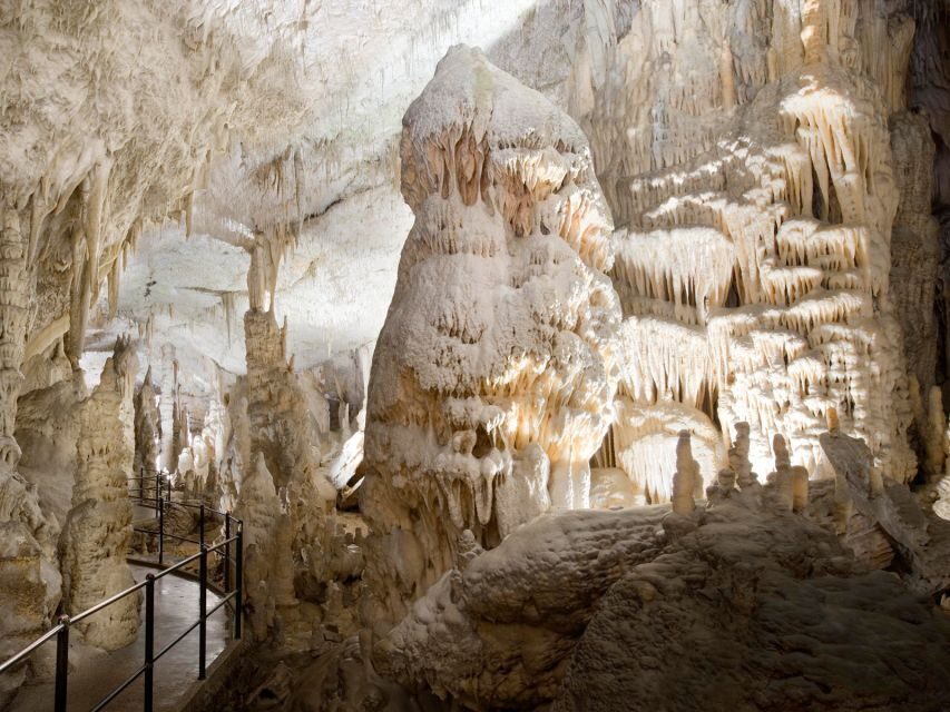 From Ljubljana: Postojna Cave & Predjama Castle Half-Day - Legends, folklore, and the quick spirit-tasting moment