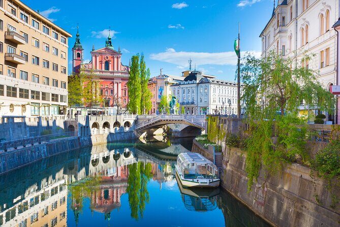 Ljubljana boat cruise and walking tour - Franciscan Church Stop: A Quick Lesson in Ljubljana’s Old-Core Style