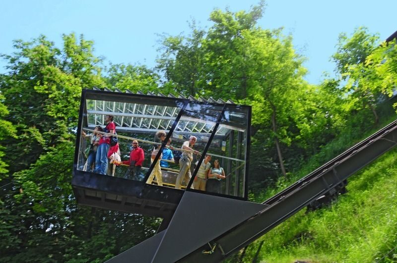 Ljubljana: Guided Walk & Funicular Ride to Ljubljana Castle - Cobblers’ Bridge, the library, and Križanke Summer Theater