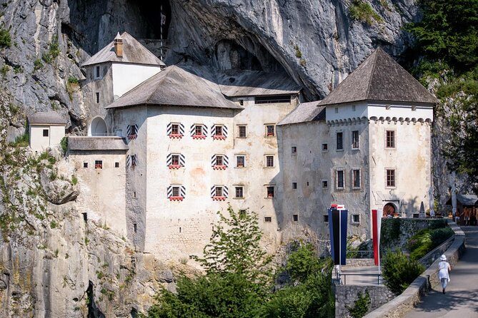 Postojna Cave & Photostop Predjama castle - Group Tour from Koper - The “Best Preserved Fairytale Castle” moment at Predjama