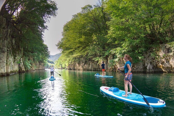 Private Half Day Stand-up Paddle Boarding on the Soča River - RED boards, wetsuits, and safety gear that reduce stress